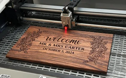 Custom wedding sign being engraved on walnut